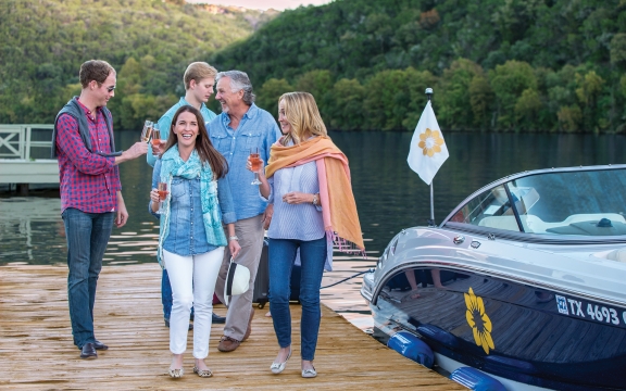 A family of five just arrives at the dock by water taxi